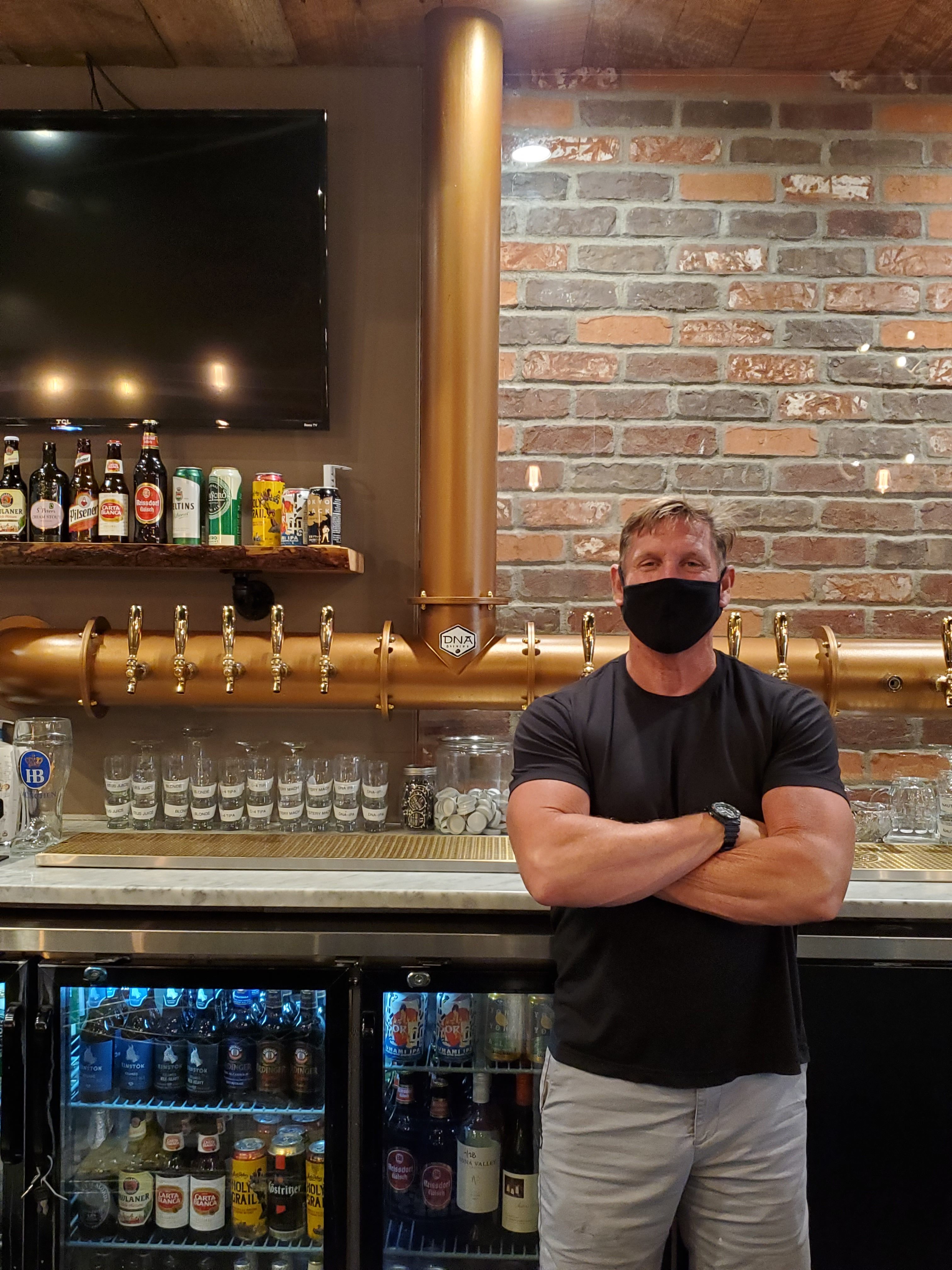 bartender wearing a mask